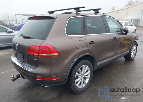 2014 Volkswagen Touareg 3.6L Sport z USA, uszkodzony, nr VIN WVGEF9BP7ED001676